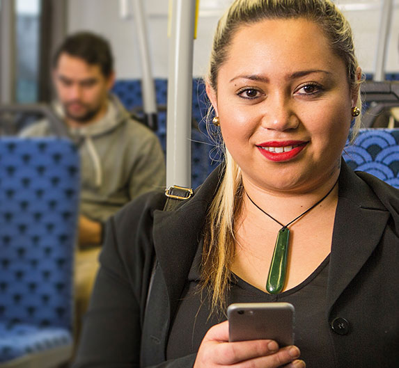 Metro bus passenger on phone