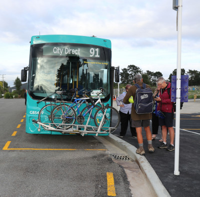 Passengers boarding the 91 City Direct bus